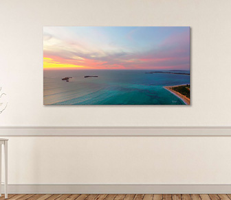 Soft Pastel Colours over Shoalwater Islands Marine Park, WA is an aerial photograph of a stunning sunset along Rockingham's pristine coastline that has a dreamy clamness about it. Available in a selection of canvas sizes. 